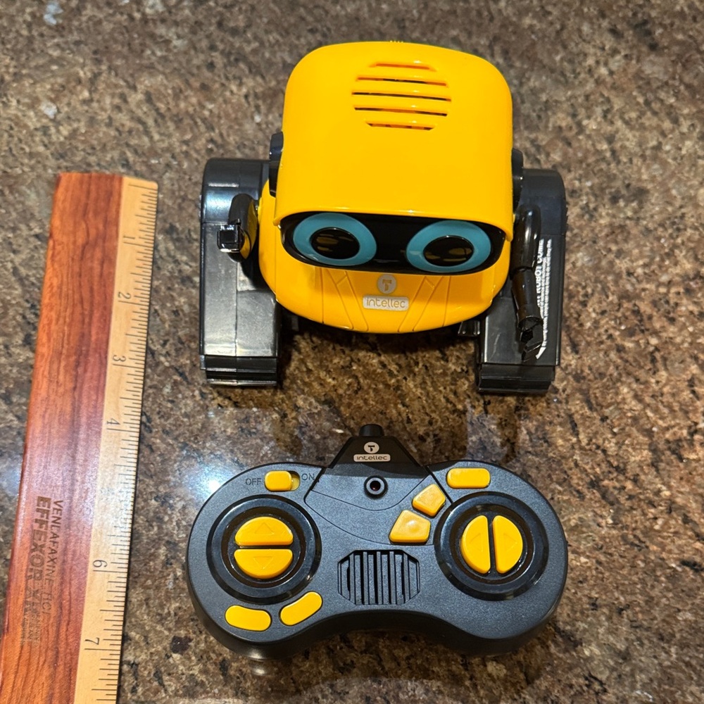 Remote Control Robot Toy With LED Eyes Flexible Head And Arms - Picture 9 of 10